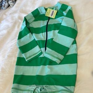 NWT swimsuit by Primary 12-18 months